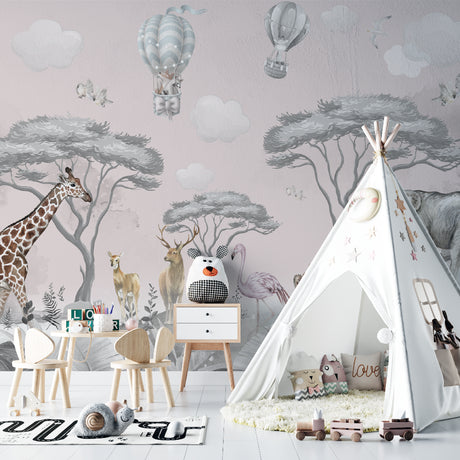 Safari nursery wallpaper with hot air balloons displayed in a bright, modern nursery with white furniture
