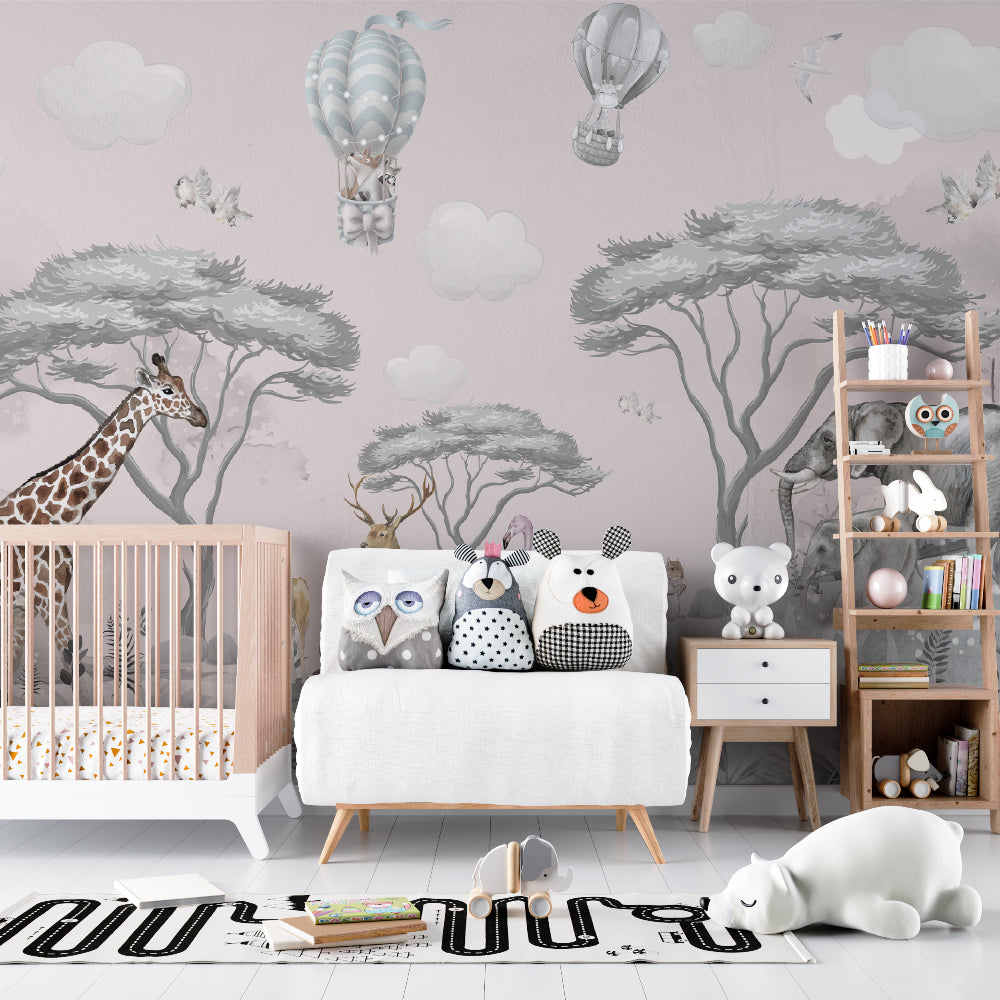 Pink safari wallpaper creating a cozy reading nook in a children's bedroom
