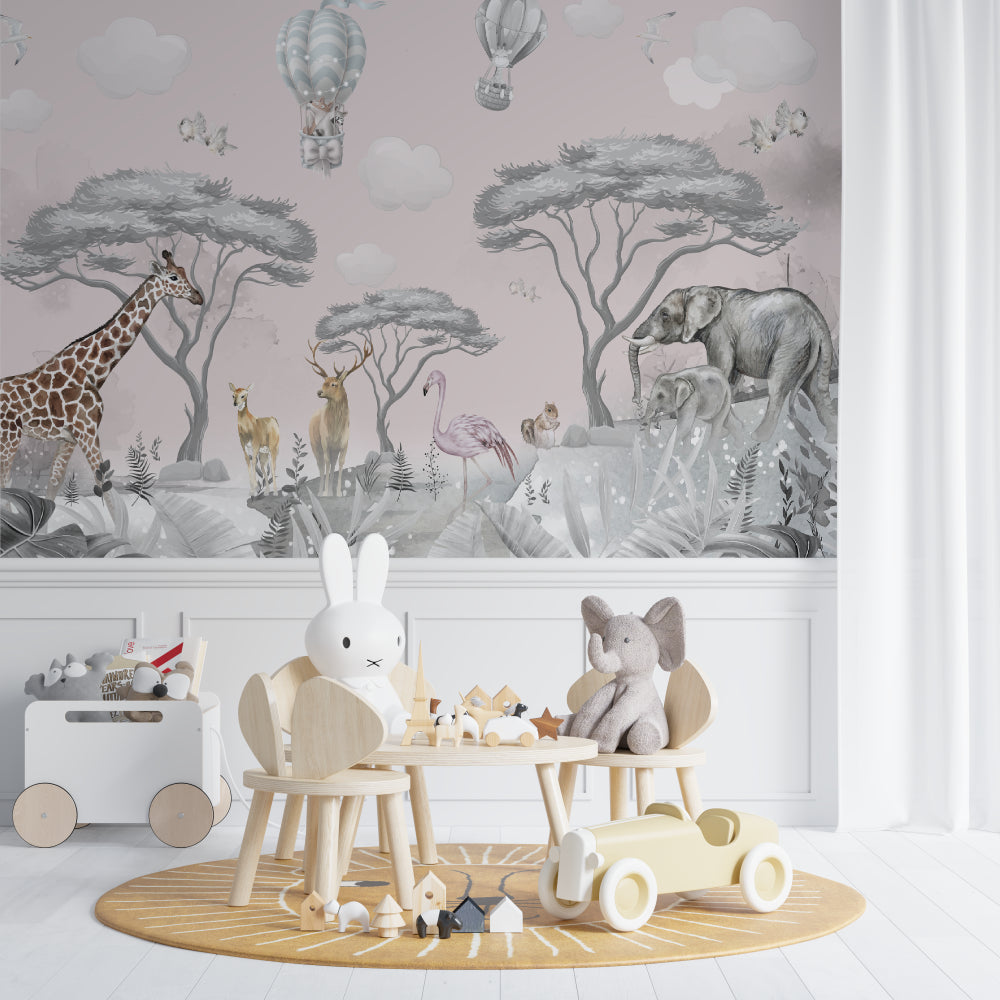 Safari animal wallpaper featuring giraffes and balloons in a playroom setting