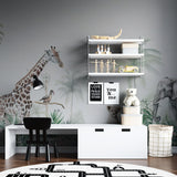 Tropical wildlife wallpaper in home office creating serene workspace