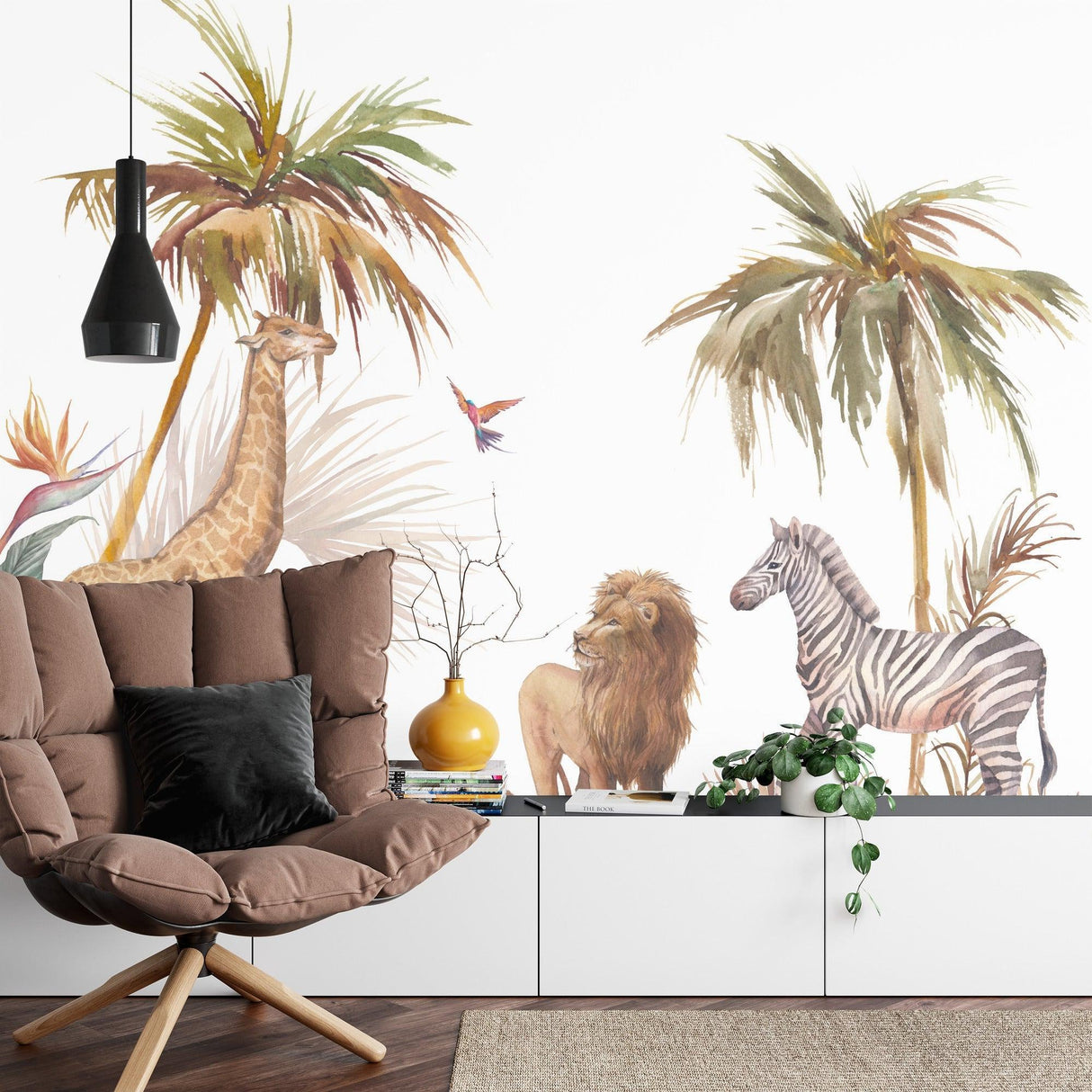 African wildlife mural wallpaper featured in a cozy children's reading nook with soft cushions