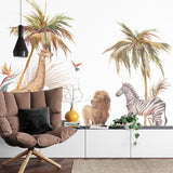African wildlife mural wallpaper featured in a cozy children's reading nook with soft cushions