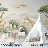 African wildlife wallpaper in modern living room showing scale of giraffe and mountain design