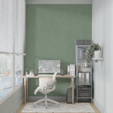 Modern green wallpaper creating serene bathroom accent wall