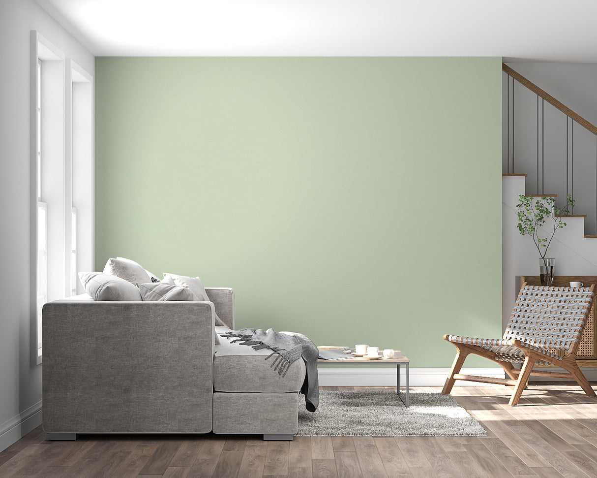 Contemporary bedroom featuring sage green wall mural with minimalist furniture