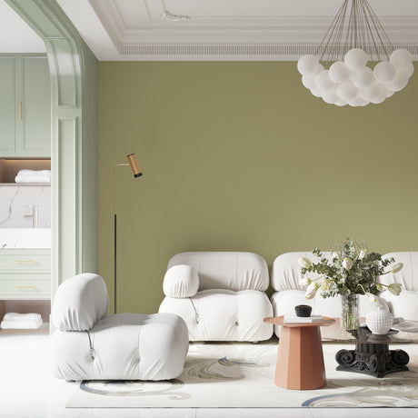 Sage green minimalist wallpaper in modern living room creating serene atmosphere