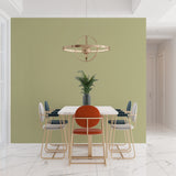 Contemporary bedroom with sage green wall mural showing clean minimal design