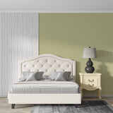 Home office featuring calming sage green wallpaper with minimalist aesthetic