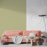 Dining room with modern sage green wall mural showing natural light interaction