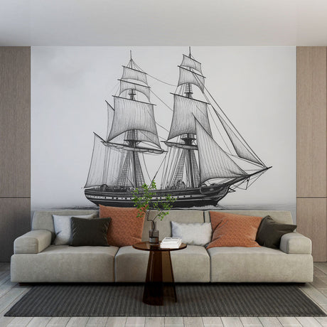 Sailing ship wall mural creating a dramatic focal point in a modern living room with minimalist furniture