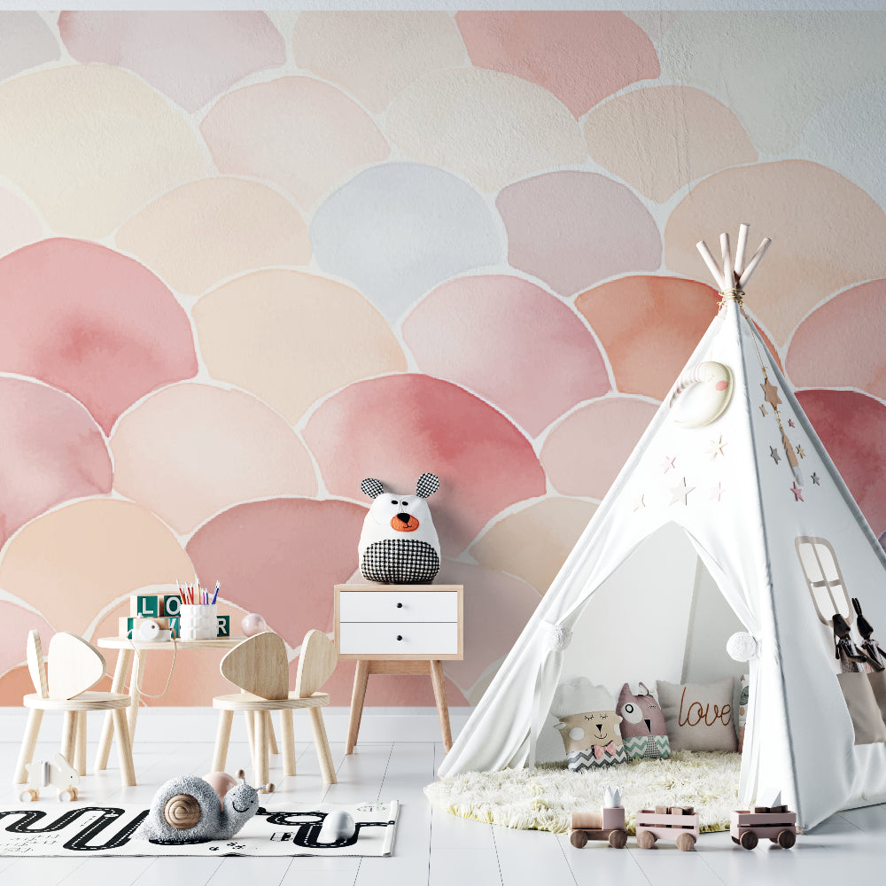 Pink watercolor scallop mural in a reading nook with cozy seating