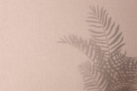 Design file showing detailed palm shadow pattern on beige background