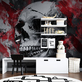 Red and black skull wallpaper making statement in urban loft bedroom