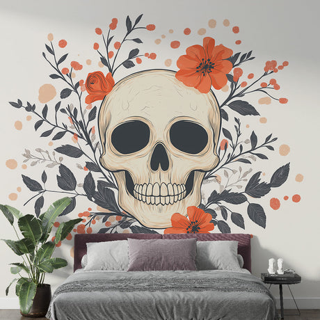 Gothic skull wallpaper with orange flowers creating dramatic impact in modern living room with grey sofa and minimal decor