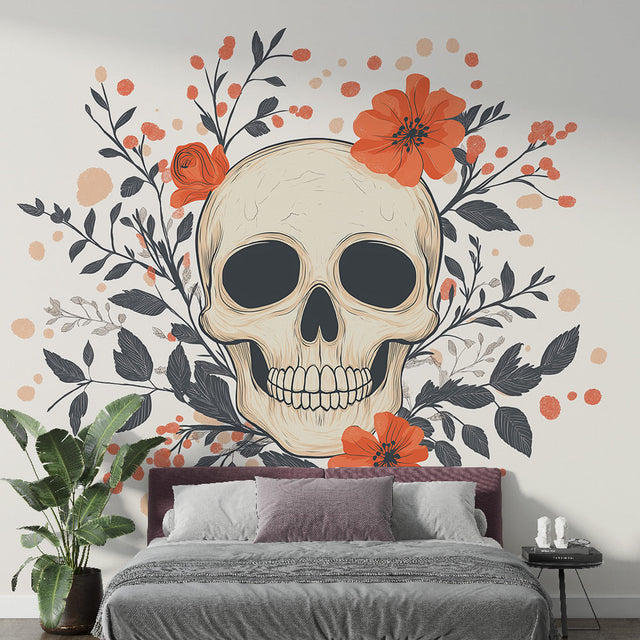 Gothic skull wallpaper with orange flowers creating dramatic impact in modern living room with grey sofa and minimal decor