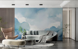 Dreamy cloud wallpaper in modern living room creating an airy, open feel