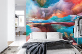 Abstract sky mural wallpaper creating a dramatic focal point in a modern living room with white furniture
