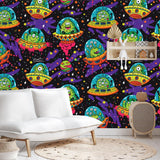 Playroom transformed with cartoon space aliens wallpaper, showing scale and vibrant colors