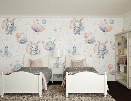 Space bunny wallpaper creating a magical atmosphere in a modern nursery with white furniture
