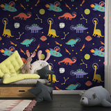 Cosmic dinosaur mural installed in a cozy nursery, showing the perfect scale of the fun space pattern