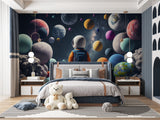 Cosmic wallpaper installation in study area showing scale of planets