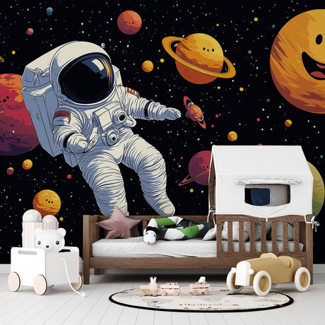 Space adventure wallpaper creates cosmic dreams in a modern kids bedroom, with happy planets and floating astronaut design