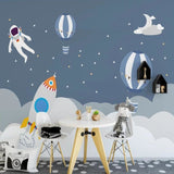 Playroom featuring space adventure wallpaper with astronaut and balloons in natural daylight