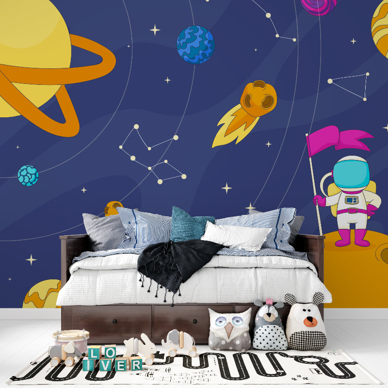 Playroom transformed with space theme wallpaper showing floating astronaut and colorful planets