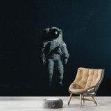 Space themed wallpaper with floating astronaut shown in modern bedroom, creating a dreamy atmosphere with starlit background