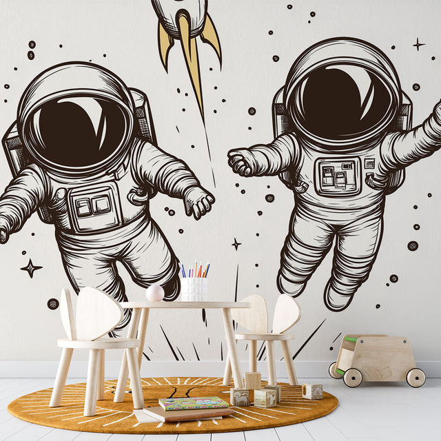 Modern Astronaut Line Art Wallpaper creating a striking focal point in a minimalist home office space