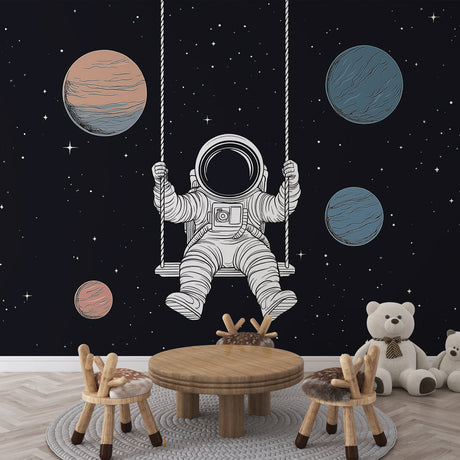 Space themed wallpaper with swinging astronaut brings wonder to a modern kids bedroom, perfect for dreamy bedtime stories