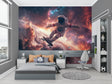 Space mural wallpaper in modern kids bedroom showing astronaut skateboarding through stars