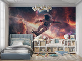 Teen bedroom with space adventure mural showing skateboarding astronaut in vibrant nebula