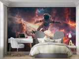 Gaming room decorated with astronaut skateboarding space wallpaper creating immersive feel