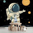 Space exploration wallpaper in modern kids bedroom showing floating astronaut and planets, perfect for inspiring young minds