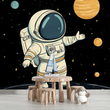 Space exploration wallpaper in modern kids bedroom showing floating astronaut and planets, perfect for inspiring young minds