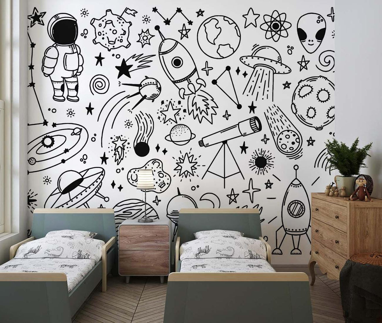 Nursery with monochrome space wallpaper showing planets and rockets