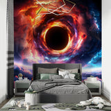 Space wallpaper featuring black hole in gaming room setup