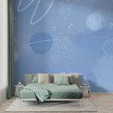 Space themed wall mural in teen study room showcasing detailed planets and stars