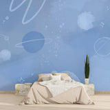 Galaxy wallpaper bringing cosmic wonder to nursery with gentle blue tones