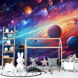 Playroom wall decorated with space wallpaper showing bright planets and constellations
