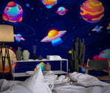Space wallpaper mural bringing cosmic wonder to a modern kids bedroom with glowing planets and UFOs