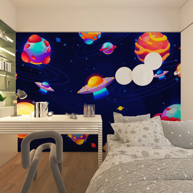 Galaxy wall mural creating depth in a child's study area with vibrant cosmic design