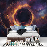 Black hole wallpaper with golden nebula creating dramatic effect in teen bedroom