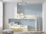 Space themed wall design transforming a playroom with dreamy celestial patterns