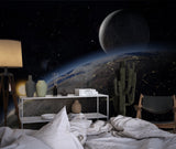 Space wall mural in teen bedroom showing Earth from space