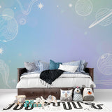 Teen bedroom with galaxy wall mural creating a sophisticated space theme