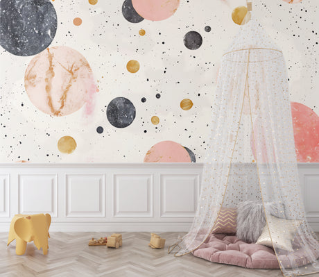 Pink and gold space wallpaper in modern nursery creating a dreamy atmosphere with soft lighting