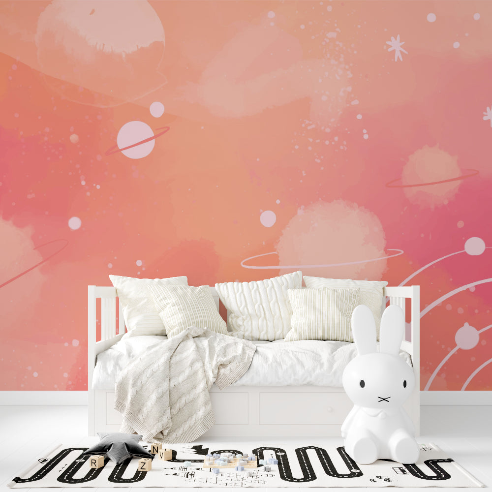 Space themed wallpaper in teenage girl's bedroom showing soft pink cosmic design