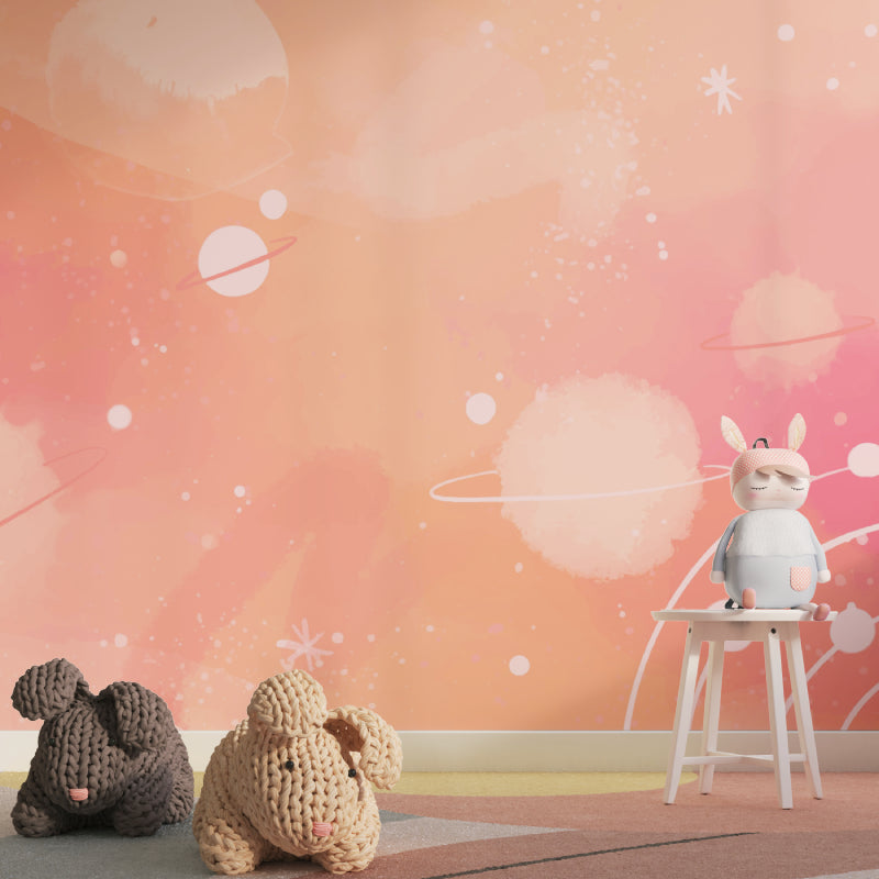 Moon and stars wallpaper brightening a cozy reading nook with gentle pink glow